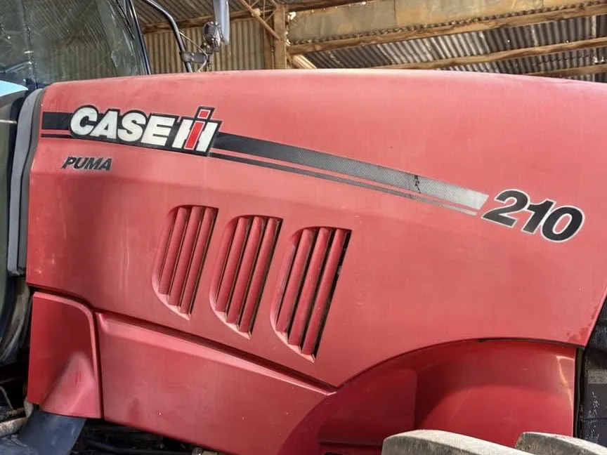 Case IH Puma 210 tractor before detailing, covered in dust