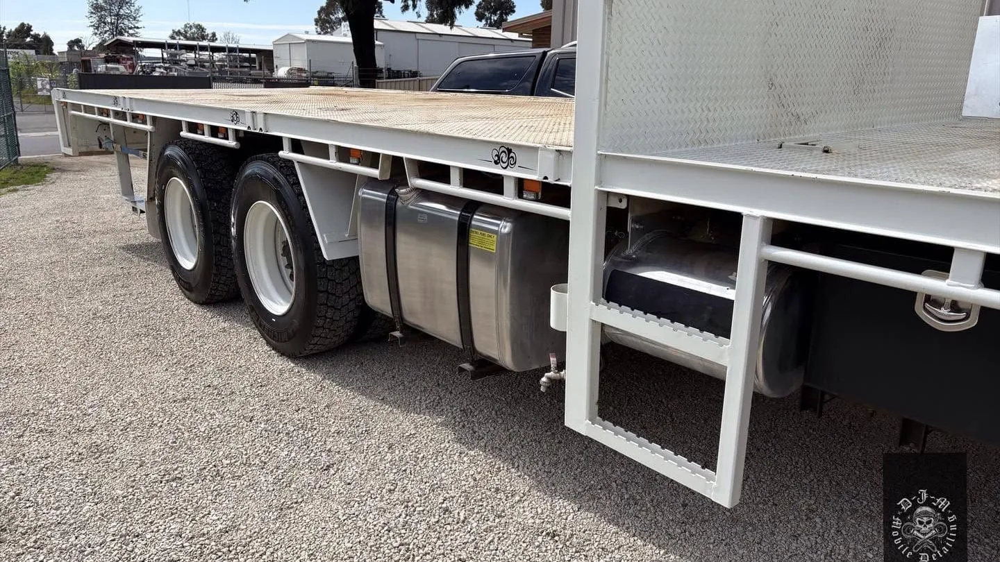 Flatbed truck tray and chassis washed down during a truck detail in Bendigo