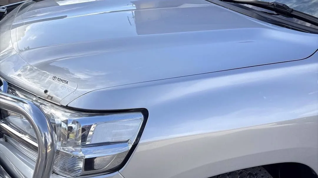 Front of a detailed silver Toyota LandCruiser at the DJM Detailing studio