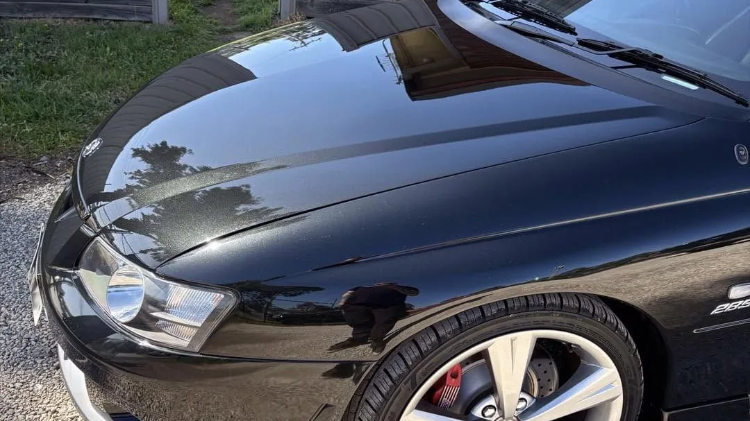 Flawless black paint after correction with Angelwax, DJM Detailing Bendigo